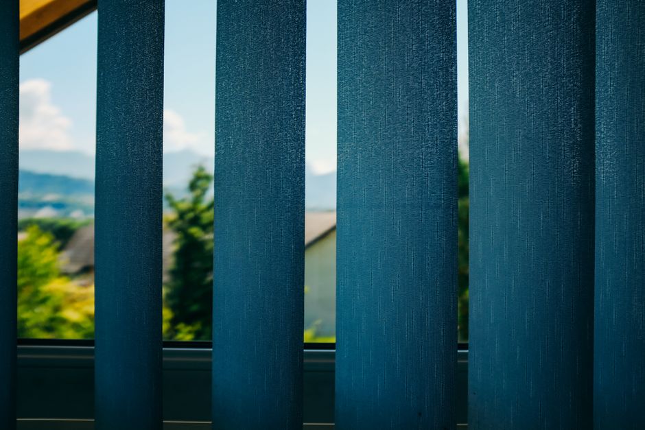 Sunlight filtering through custom window blinds